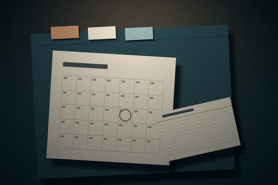 Placeholder still life: a calendar sheet with one date circled next to a small index card
